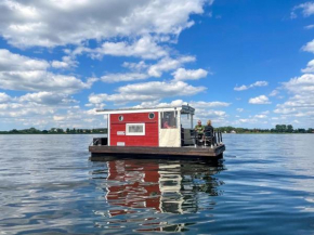 Hausfloßvermietung auf der Peene am Kummerower See in Mecklenburg Vorpommern 15 PS